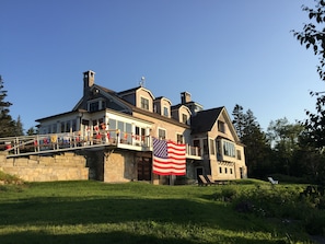 Sunset's from north deck, HighTide dressed for 4th of July