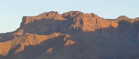 The imposing Superstition Mountains are your backdrop