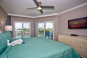 Master Bedroom with King size bed and direct access to the waterfront balcony.