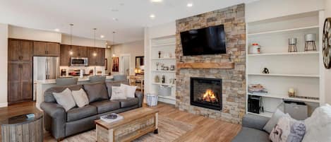 Expansive open floor plan with Fireplace and Mounted TV