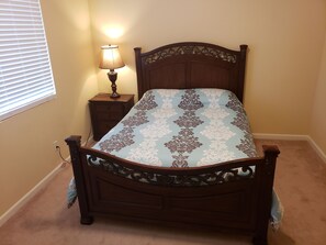 down stairs bedroom  queen size bed