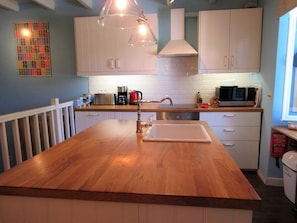 A new Induction cooktop is just one of the changes made in this kitchen.