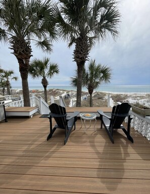 New porch to watch the sunset! Semi private beach