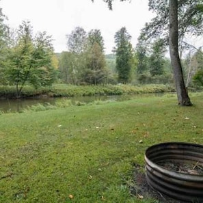 Larger fire pit by river