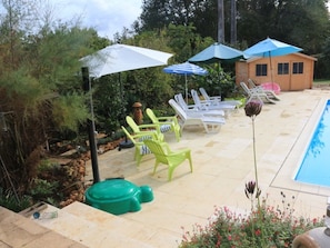 Sun Patio shower & pool house for storage of outdoor furniture & cushions 