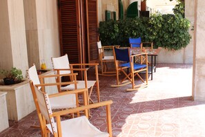 Spacious terrace with direct access onto the beach.