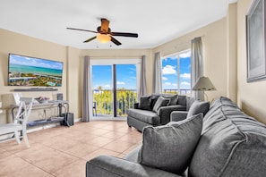 Living room with large TV and Ocean Views