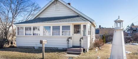 Front of cottage. Street view on Northern Boulevard.