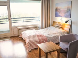 Furniture, Interior Design, Floor, Flooring, Bed, Bedroom, Wall, Wood, Room, Wood Flooring