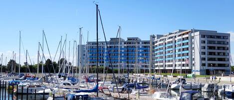 Water, Boat, Sky, Watercraft, Building, Vehicle, Dock, Mast, Ship