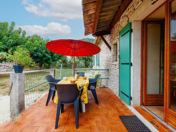 Sky, Property, Furniture, Table, Plant, Cloud, Building, Azure, Shade, Architecture