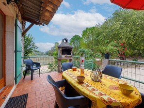Sky, Plant, Furniture, Table, Cloud, Property, Flowerpot, Nature, Chair, Azure