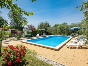 Sky, Water, Plant, Swimming Pool, Flower, Building, Tree, Shade, Outdoor Furniture, Chair