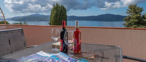 Cloud, Sky, Water, Table, Bottle, Property, Furniture, Azure, Tree, Outdoor Furniture