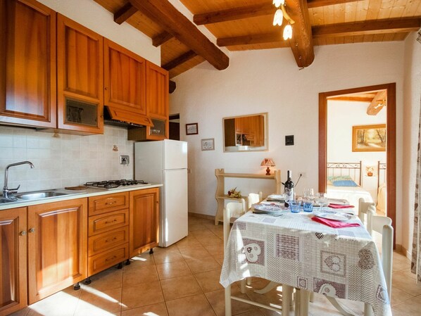 Kitchen Sink, Cabinetry, Property, Furniture, Sink, Countertop, Table, Building, Wood, Chair