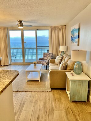 Spacious living room with a large private balcony overlooking the gorgeous Sea.