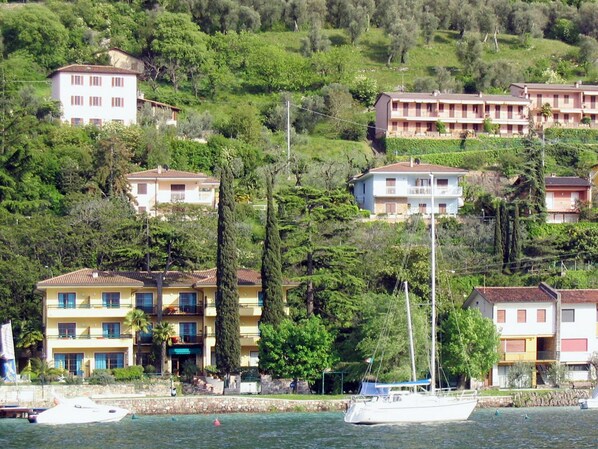 Water, Building, Boat, Property, Watercraft, Tree, Nature, House, Vegetation, Lake