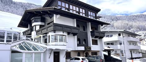 Cloud, Sky, Building, Property, Window, Mountain, Snow, Car, Vehicle, House