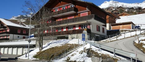 Sky, Snow, Property, Building, Mountain, Slope, House, Residential Area, Window, Roof