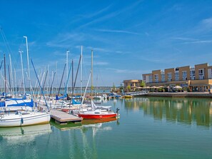 Water, Boat, Sky, Watercraft, Cloud, Vehicle, Building, Lake, Mast, Dock