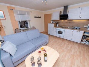 Möbel, Eigentum, Couch, Cabinetry, Tabelle, Interior Design, Haushaltsgerät, Beleuchtung, Wohnzimmer, Holz