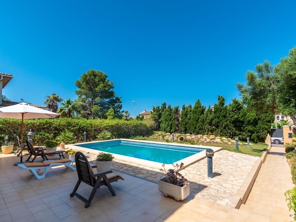 Water, Plant, Sky, Swimming Pool, Building, Azure, Shade, Tree, Outdoor Furniture, Chair