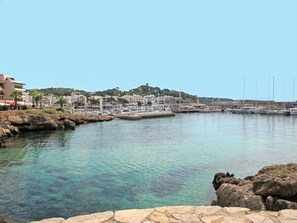 Water, Sky, Daytime, Azure, Building, Coastal And Oceanic Landforms, Body Of Water, Landscape, Beach, Natural Landscape