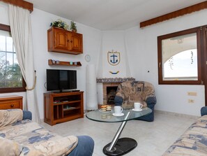 Möbel, Pflanze, Komfort, Holz, Bilderrahmen, Cabinetry, Interior Design, Fenster, Wohnzimmer, Flooring