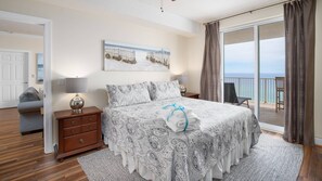 Second master bedroom with king sized bed and access to baclony