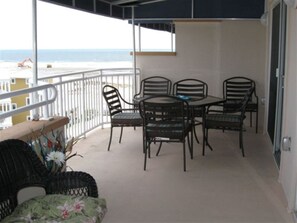 Balcony has dining for six and two more at the high top table