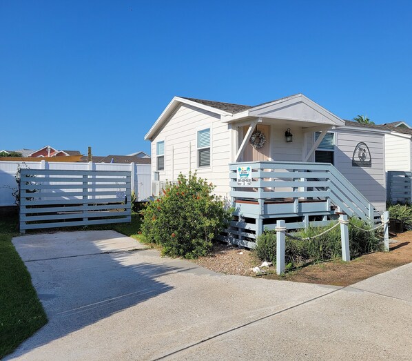 Coral Cottage has reserved parking for one vehicle.