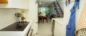 Granite kitchen island with a 18 bottles wine fridge for your enjoyment. 