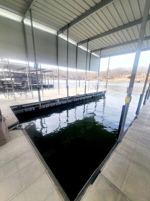 Huge Empty16 X 36 Covered Boat Slip for Guest use, with planted crappie beds.