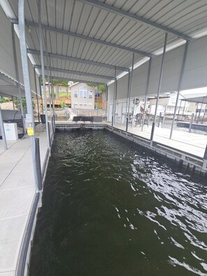 Empty boat slip with side panels for guest use
