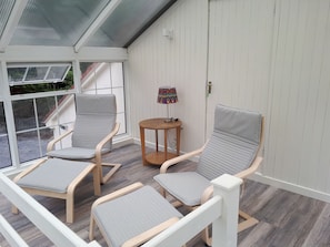 Seating area overlooking garden