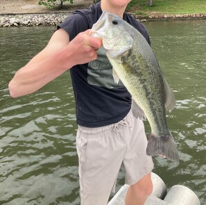 Large mouth bass caught off the paddle boat 300’ from dock with crank bait