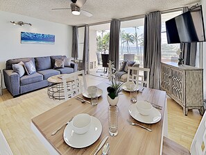 Dining Area - Sit at this dining table for four while listening to the ocean waves!