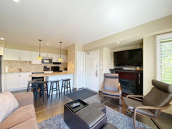 Seating Area, Kitchen, and Fireplace