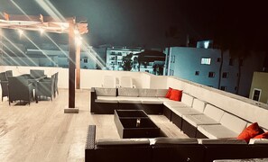 Private roof top terrace after sunset 