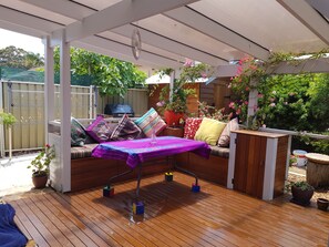 Colourful back covered deck