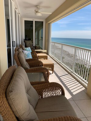 Large, spacious balcony with lots of seating and a table for eating outside!