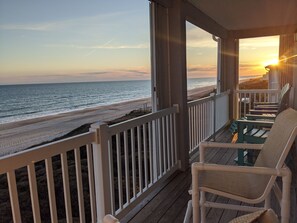 Relax with family on the expansive view of the Atlantic on the oceanfront deck.