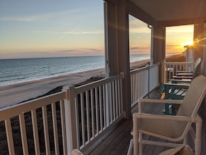 Relax with family on the expansive view of the Atlantic on the oceanfront deck.