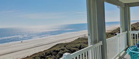 Breathtaking expansive Ocean Front view sitting from your top story private deck