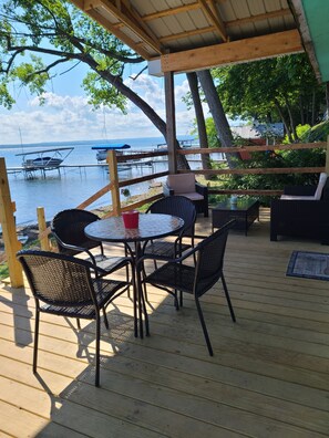 Just step out onto the deck from the living area to enjoy lake living.