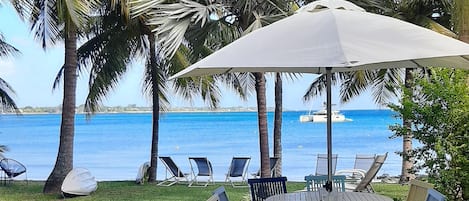 view of front garden and beach from the veranda.
