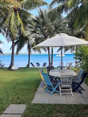 view of front garden and beach from the veranda.

