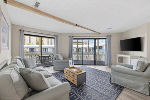 Brand New Sofa and Club Chairs and plenty of natural light!