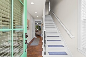 Head up the stairs and choose your bedroom.