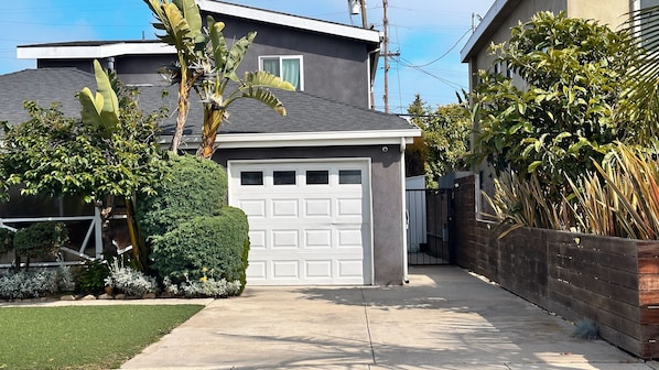 Use Driveway to Enter the Black Gate to your Guest House
